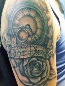 realistic carpe diem tattoo with a clock and a rose