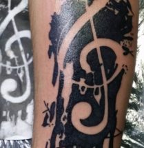 Muziek noot tatoeage abstract