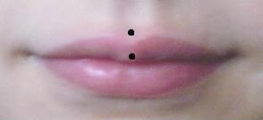 lip piercing, jestrum