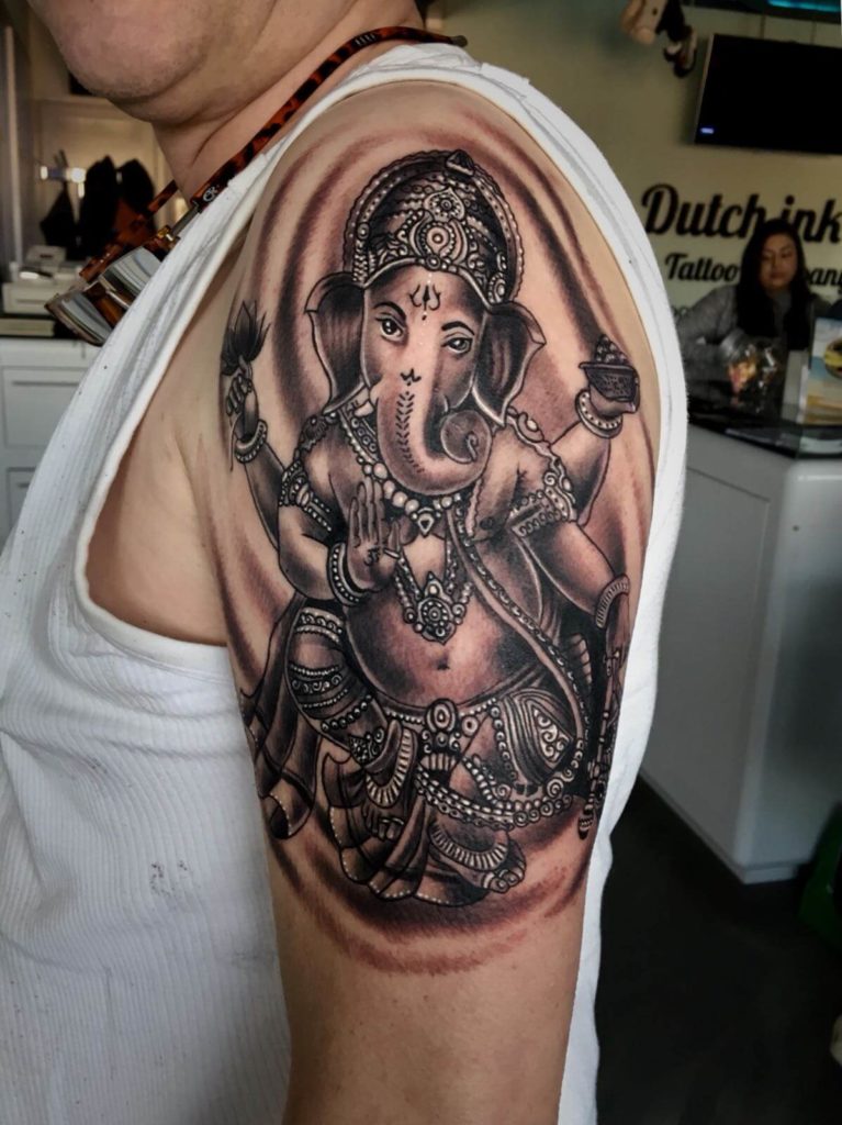 Ganesha op bovenarm